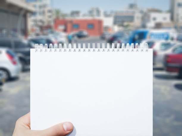 空白笔记本和停车背景图片下载