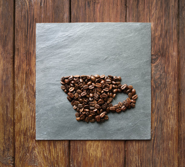 石头背景下的咖啡杯图片下载