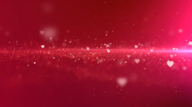 红色的情人心和闪闪发光的粒子图片下载