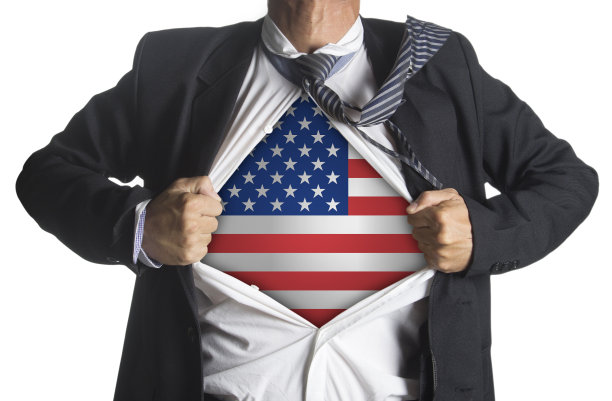 美国国旗，商人穿着超级英雄套装图片下载