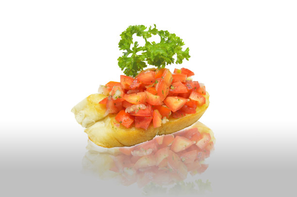 用欧芹叶装饰的番茄意式烤面包图片下载