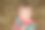 小男孩的特写肖像在红绿色的衣服。图片下载