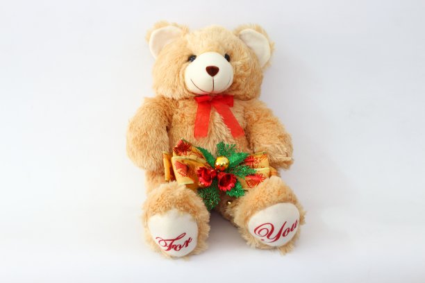 基思·布朗熊和白色背景下的圣诞钟声。图片下载