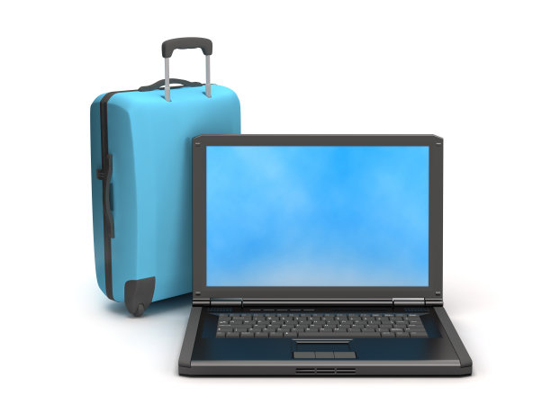 白色背景的笔记本电脑和旅行袋图片下载