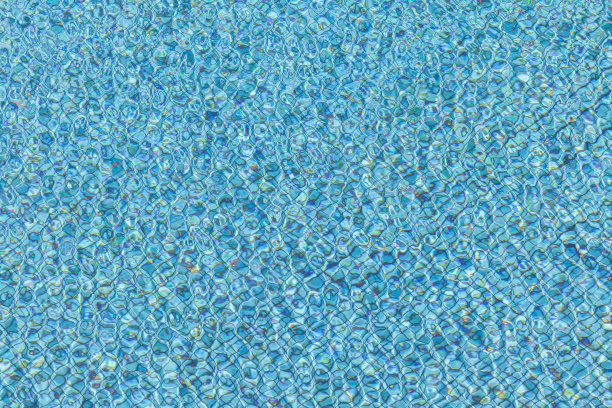 游泳池中蓝色的水的背景和纹理图片下载