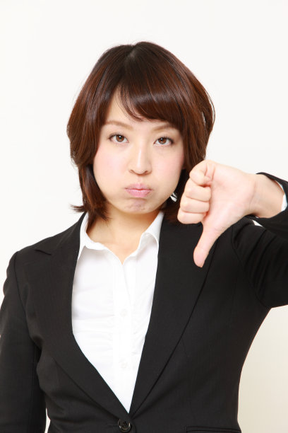 女商人做拇指向下的手势图片下载