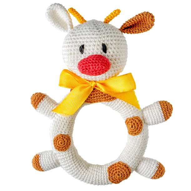 编织的儿童玩具牛孤立在白色背景图片下载