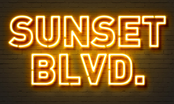 夕阳大道霓虹招牌图片下载