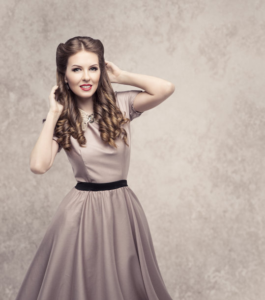 女性复古美发型，时尚模特在优雅的复古连衣裙图片下载