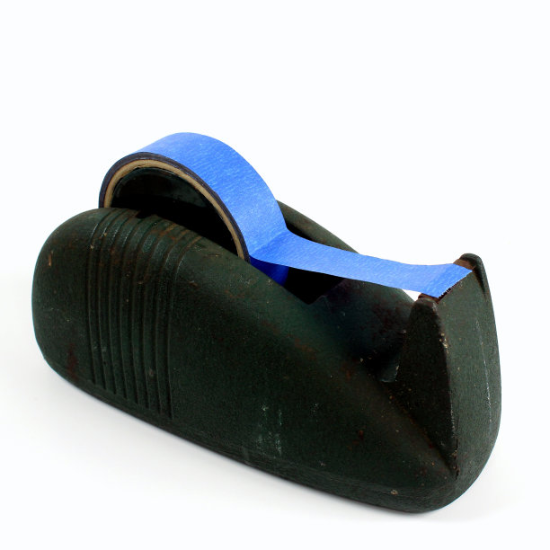 旧的绿色铸铁胶带分发器图片下载