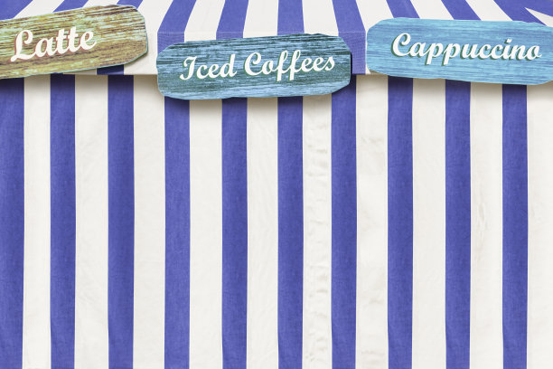 马戏团风格的彩色帐篷上的特色咖啡广告图片下载