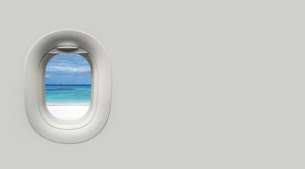 海滩和热带海在飞机窗口和地方的文本图片下载