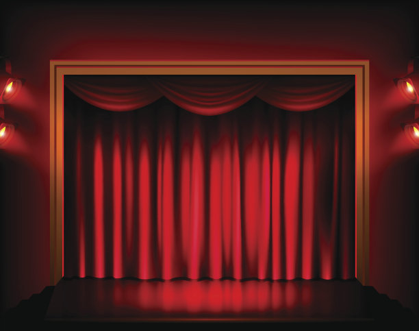 有红色窗帘和聚光灯的剧场舞台。图片下载