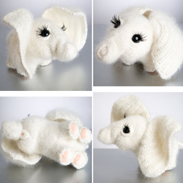 灰色背景上的玩具大象图片下载