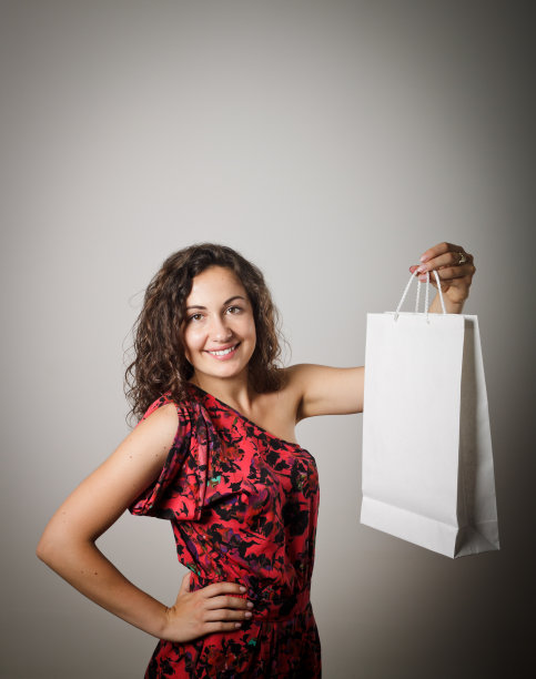 女孩和纸袋。图片下载