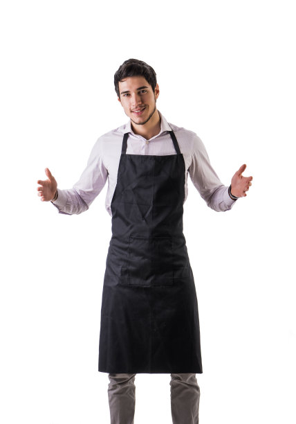 年轻的厨师或服务员穿着黑色围裙孤立图片下载