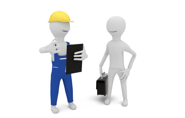 建造者向客户解释建筑平面图图片下载