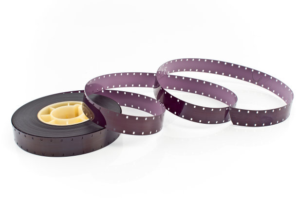 16mm胶片卷轴隔离在白色上图片下载