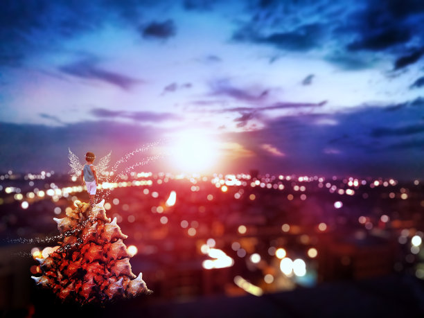 仙女般的孩子在看日出的城市景观图片下载