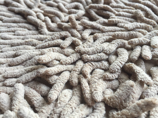 旧的肮脏的门垫，清洁和擦脚。背景纹理图片下载