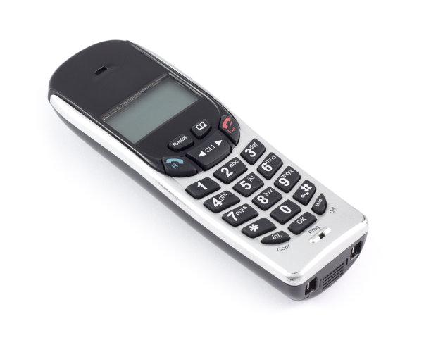 白色背景下的便携式房屋或办公室电话图片下载