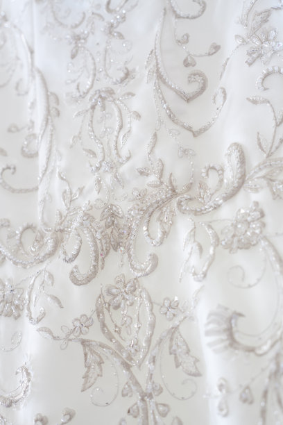 近距离细节的传统白色婚纱与刺绣图片下载