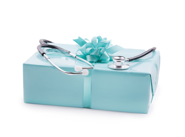 在一个绿松石礼盒上的听骨-孤立在白色图片下载