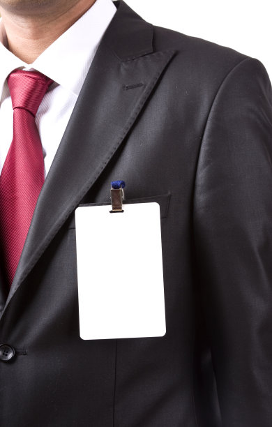 一个戴着空白胸牌的商人图片下载