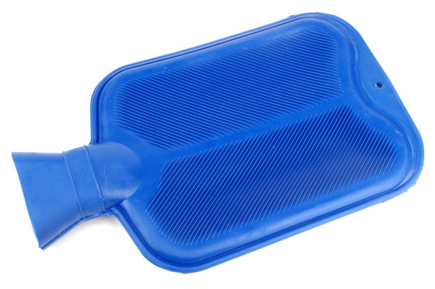 蓝色橡胶热水瓶隔离在白色图片下载