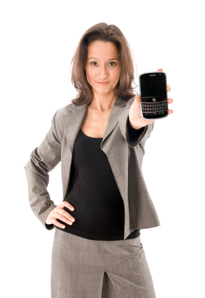 有移动电话或掌上电脑的女商人图片下载