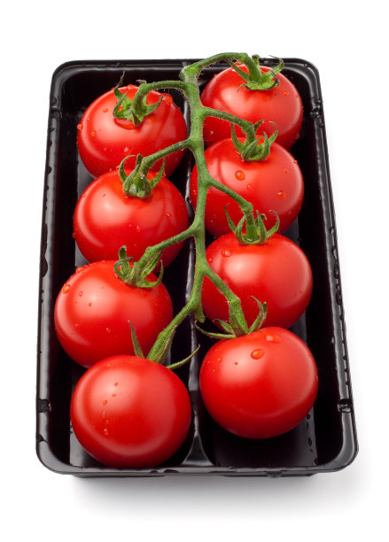 白色的塑料容器里的圣女果图片下载