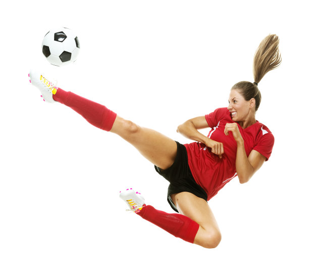 足球运动员跳着踢着球图片下载