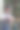 蹒跚学步的小男孩摇着圣诞礼物图片下载