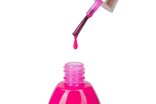 带刷子的粉色指甲油瓶子图片下载