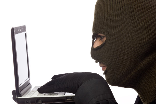 戴着滑雪面具的电脑黑客图片下载