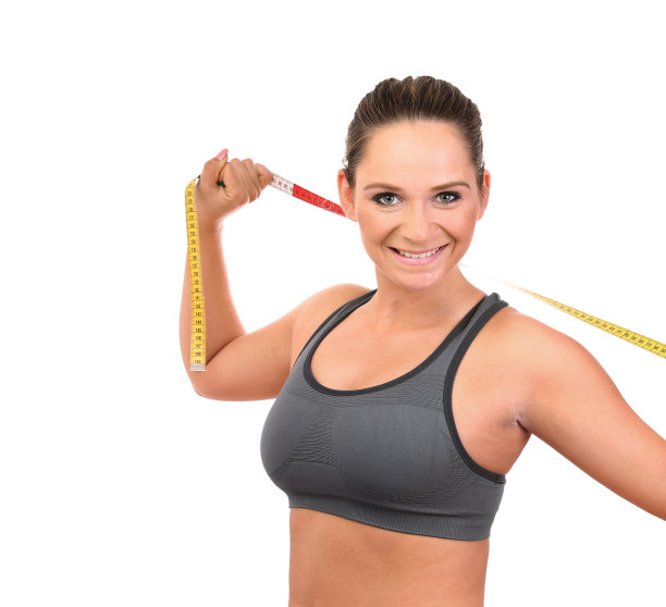 带着卷尺微笑的健身女性，与世隔绝图片下载