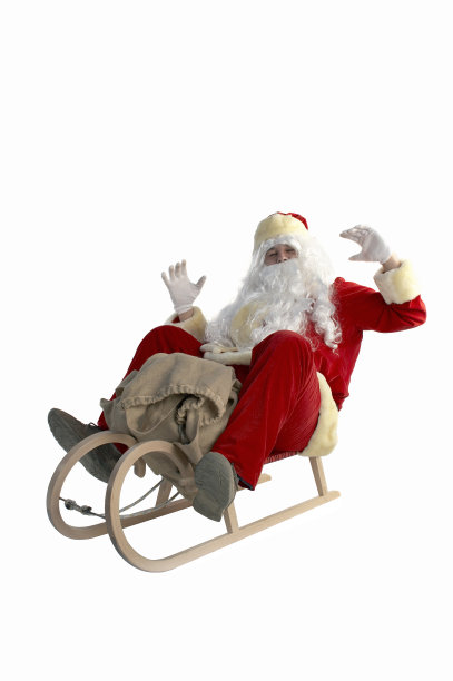 圣诞老人坐着雪橇，被孤立在白色的背景下图片下载