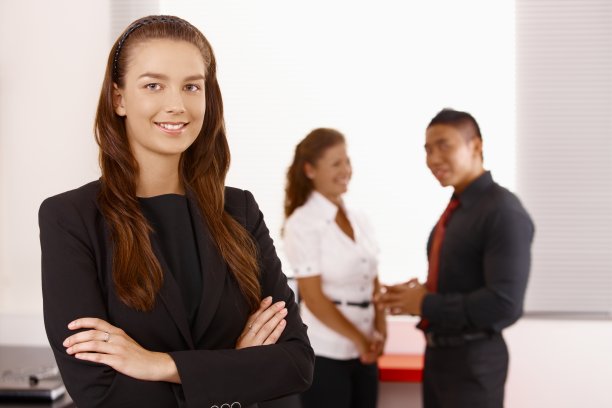 年轻女商人和团队的肖像图片下载