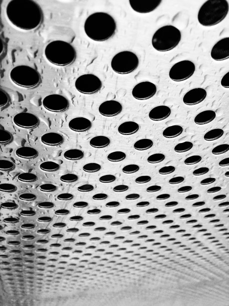 带有孔背景的钢炉排图片下载