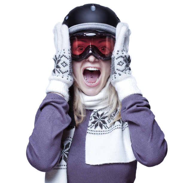 漂亮女孩戴着头盔，围巾和手套尖叫图片下载