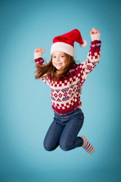 圣诞老人的快乐小助手高兴地跳起来图片下载