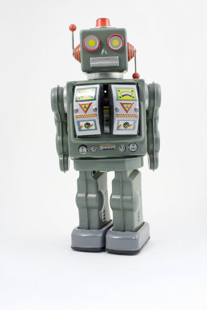 60年代的塑料玩具太空机器人，带着光和天线。图片下载