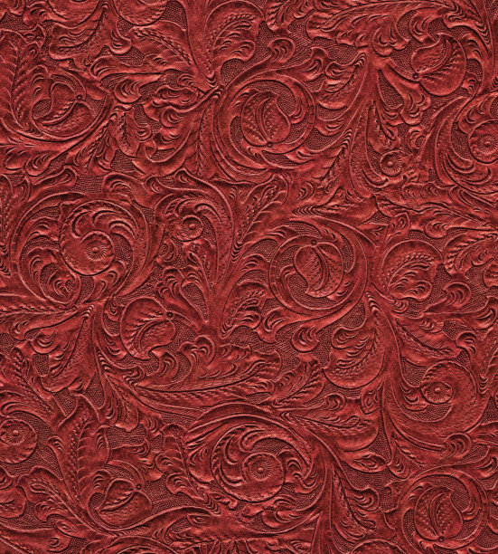 古皮革上雕刻的卷轴图片下载