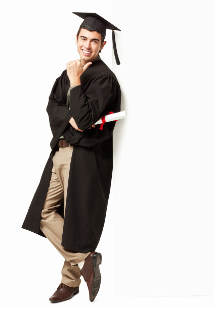 毕业生靠在墙上-孤立图片下载