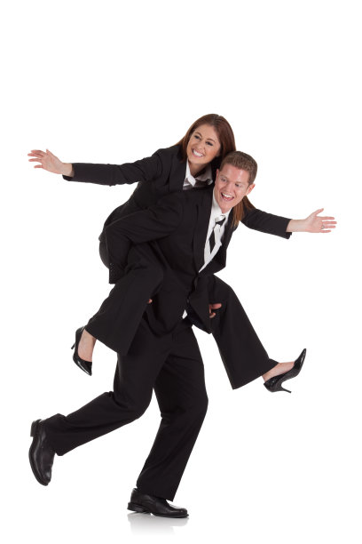 女商人骑在商人背上图片下载