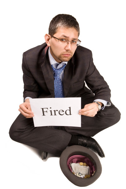 有“解雇”标志的商人图片下载