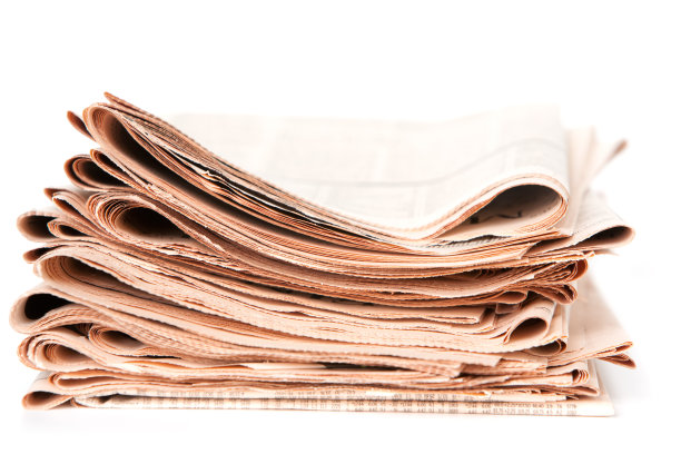 一叠财经报纸图片下载