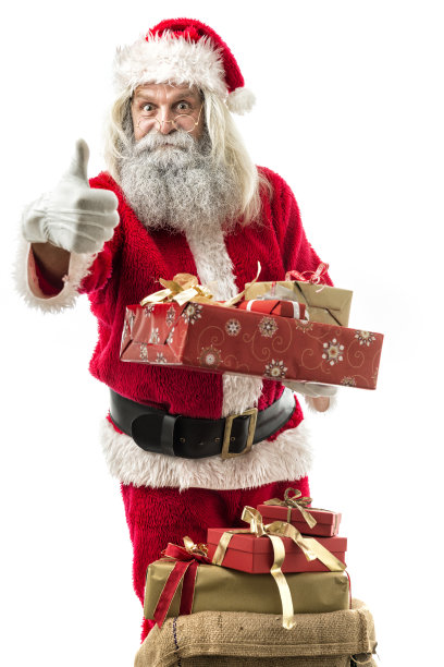 圣诞老人抱着一份礼物孤立在白色图片下载