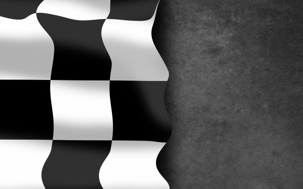 挥舞着带有黑板背景的格子旗图片下载