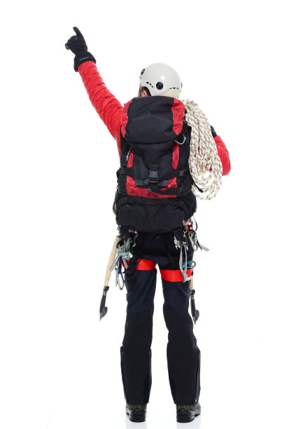 冰上攀登者的后视图指向远方图片下载